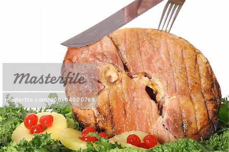 carving a gorgeous ham