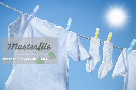 Clothes drying on clothesline on a summer day