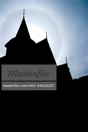 A silhouette of an old Norwegian Stave Church