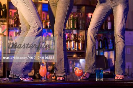 3 Women Dancing On Bar With Drinks