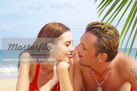 a portrait of attractive couple having fun on the beach.