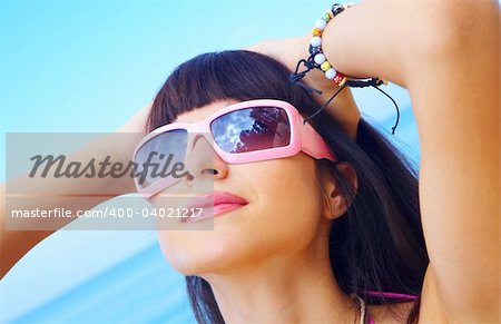 portrait of a young gorgeous female in summer environment