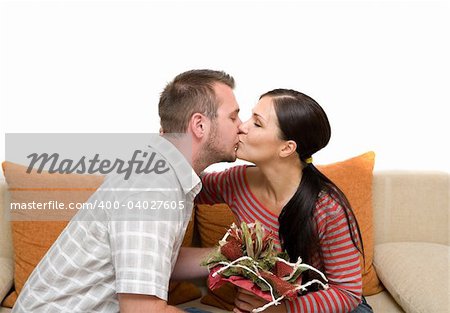 angry couple sitting on sofa