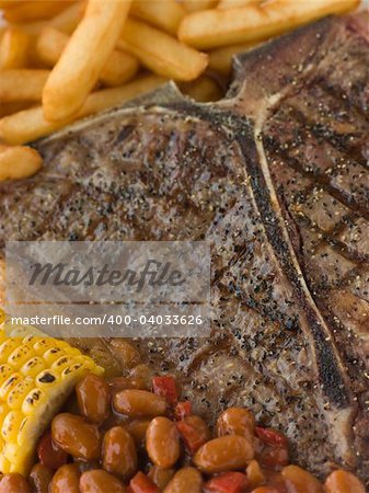 T-Bone Steak with Fries Corn and Beans