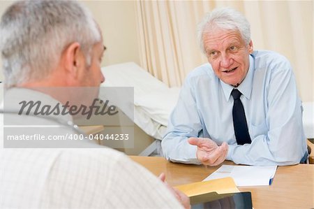 Man in doctor's office smiling