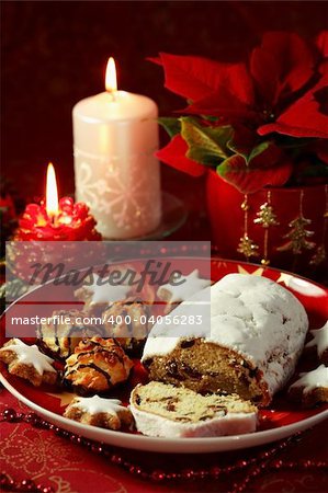 Still life with delicious Christmas cake and cookies