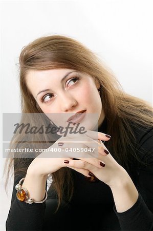 Portrait of a young woman. On the hand the amber bracelet.