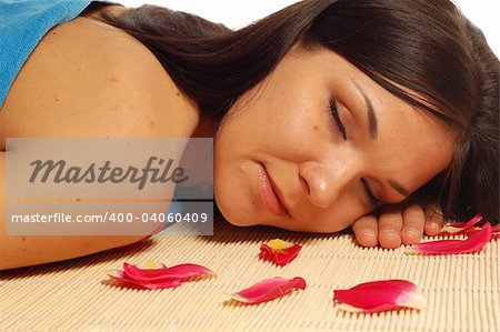 attractive brunette woman relaxing in spa salon