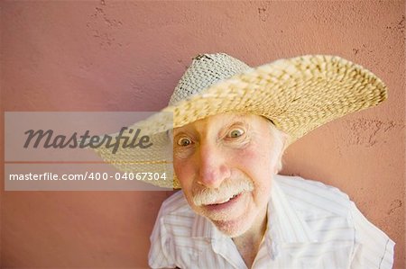 Crazy man in a big straw hat