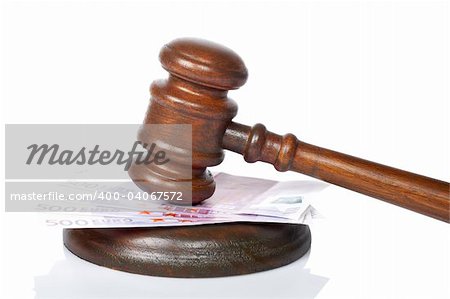 Wooden gavel and euro bills from the court isolated on white background