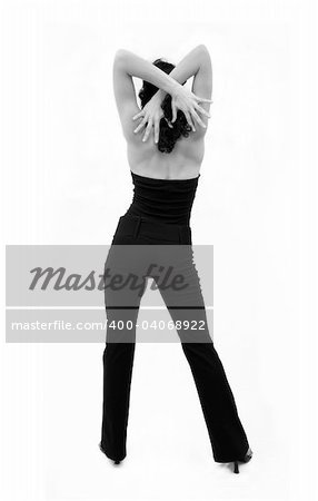 Portrait of younf seductive fashion woman standing isolated - back view