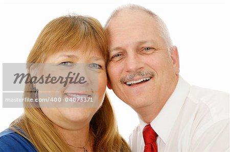 Beautiful mature couple in love.  Headshot over white background.