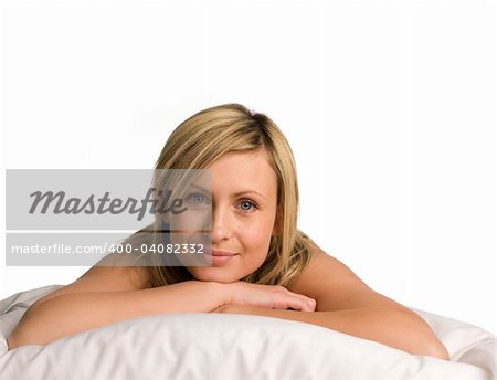 Beautiful Woman lying on a bed