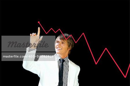 young business man pointing to a chart isolated on black