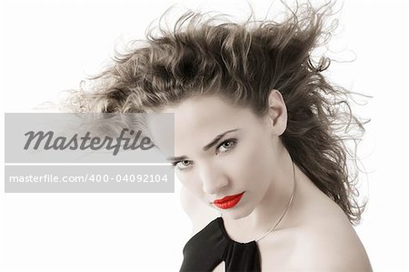 cute portrait of young charming woman with stunning eyes and windly hair
