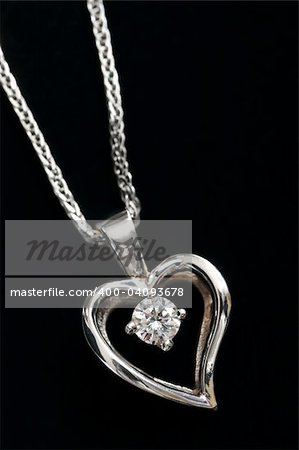 White gold heart pendant with diamond on a chain