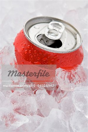 Red Can Of Fizzy Soft Drink Set In Ice With The Ring Pulled