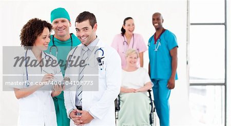 Group of Doctors with patients in background