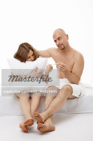 The man approves pregnancy of the woman, a scene in bed