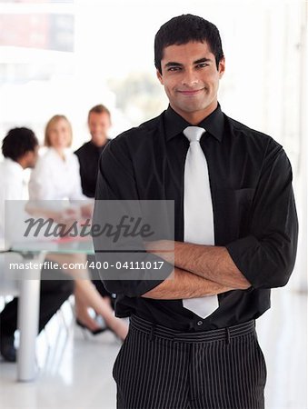 Young businessman looking at the camera