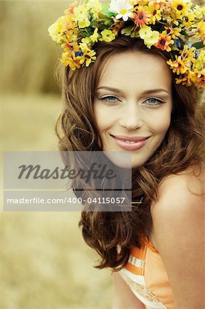 autumn woman close-up portrait with nature on the background