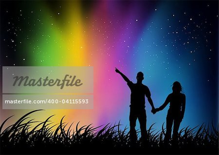 A youth couple watching an Aurora.