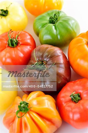 Close up group of multi colored heirloom tomatoes