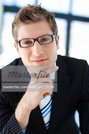 Confident Business man Standing and with a positive expression