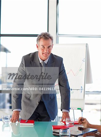 Senior businessman in office looking at the camera