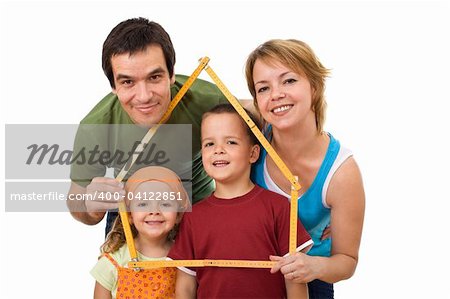 Happy family with their kids planning to buy a new home - isolated