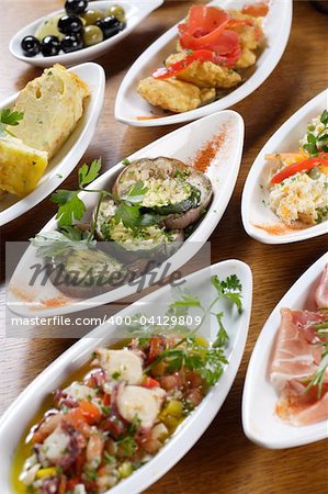 A table full of traditional Spanish tapas.