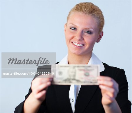 Young attractive Business woman holding dollars to the camera