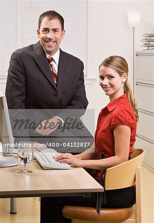 Business people sitting at desk