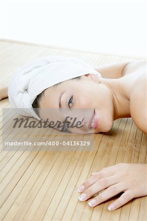 Beautiful spa blue eyes woman relax over white background