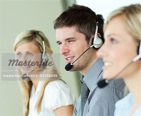 Young people working headsets in an office