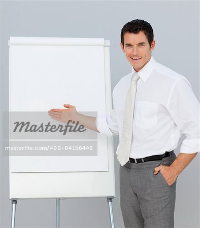 Confident businessman giving a presentation in the office