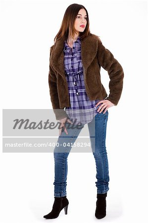 fashion model looking left with fur coat on a white background