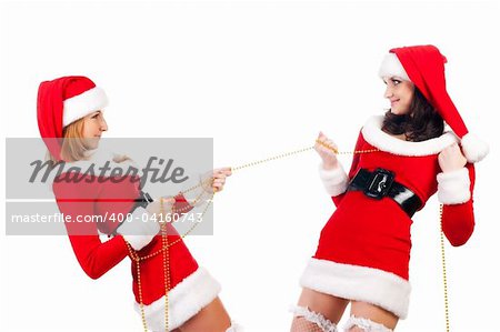Two sexual girls in Christmas clothes . Isolated over white background .