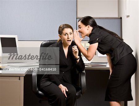 Co-workers gossiping