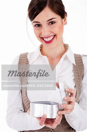Women smiling and happily opening her gift on a white isolated background
