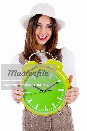 Beautiful young model with hat and showing clock on isolated white background