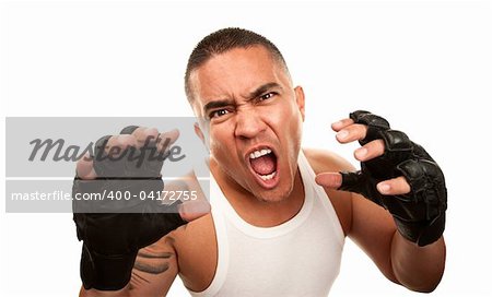 Hispanic man in t-shirt wearing mixed martial arts gloves