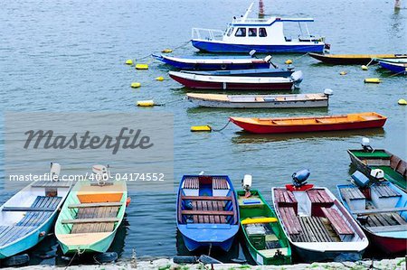 Many small fishing boats anchored on Danube river in Belgrade