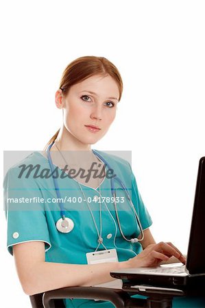 The young medical nurse with the laptop.