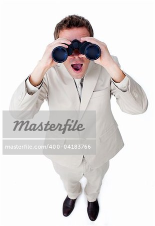 Surprised businessman looking through binoculars isolated on a white background