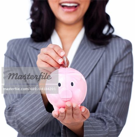 Focus on a piggybank against a white background