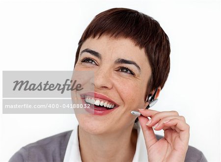 Smiling customer service representative using headset against a white background