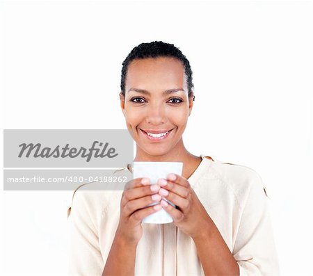 Charming businesswoman holding a drinking cup against a white background