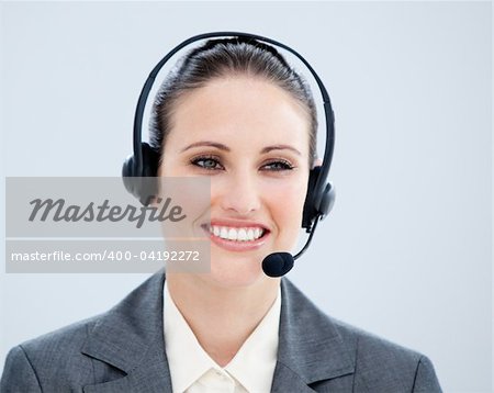 Smiling businesswoman with headset on