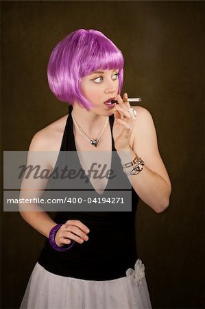 Portrait of woman with shiny purple hair caught smoking